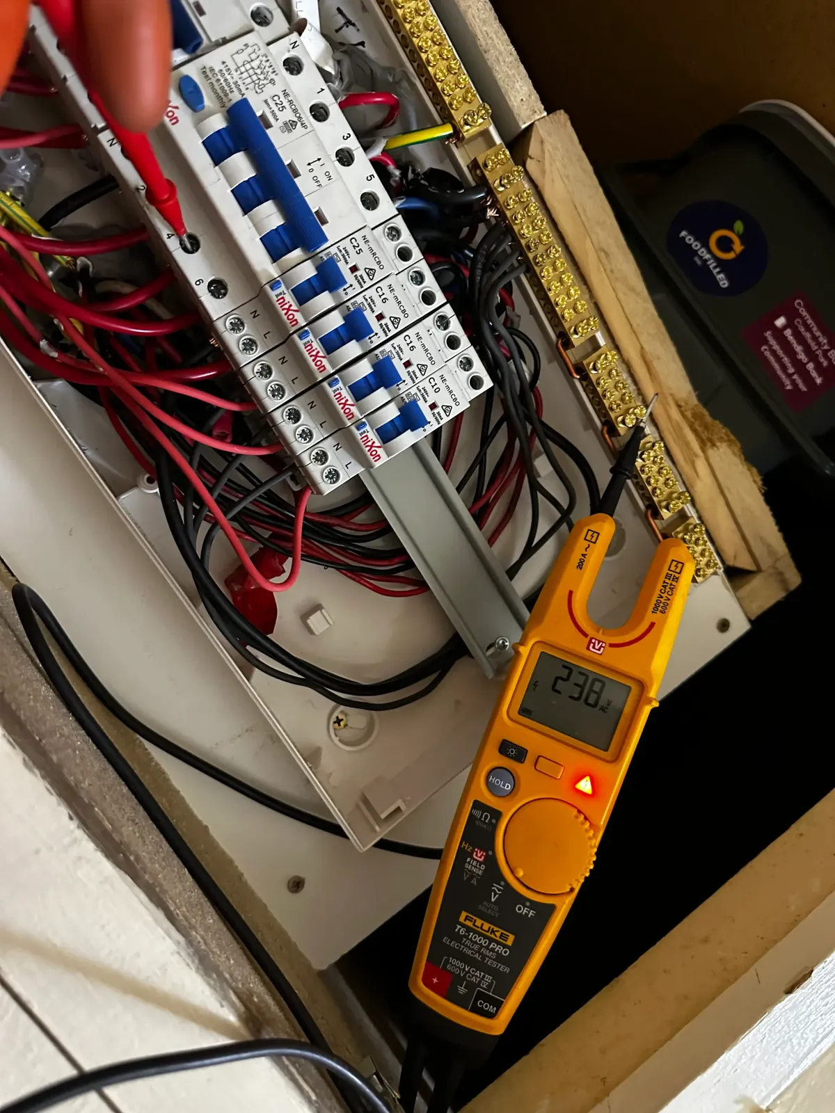 Electrical tester near a switchboard